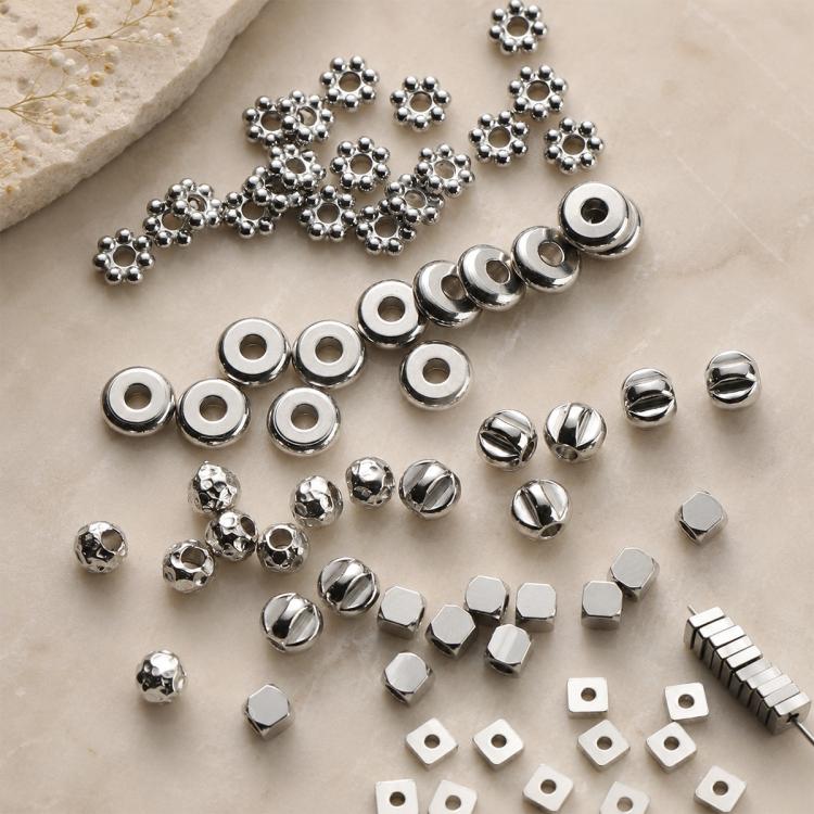 Distanziatori e perline in acciaio al titanio resistenti all'ossidazione: accessori fai-da-te per cinturini per cellulari.
