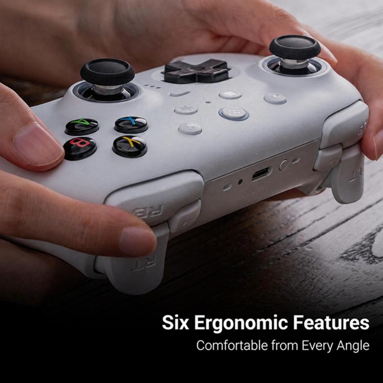Gamepad wireless Bluetooth 2.4G 8BitDo Orion di seconda generazione con base di ricarica.