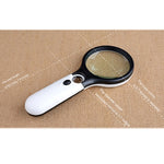 Mini lente d'ingrandimento portatile 3-45X con 3 LED