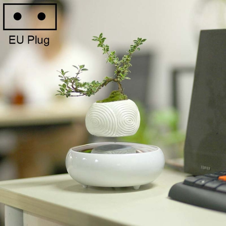 Vaso da fiori a levitazione magnetica con base in resina