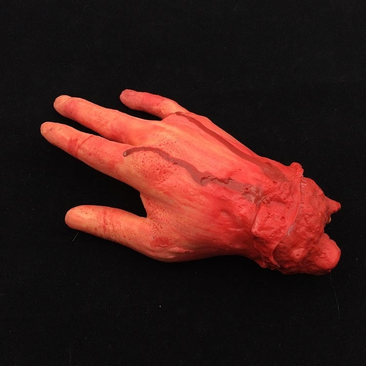 Mano finta insanguinata Halloween 4 dita 23cm