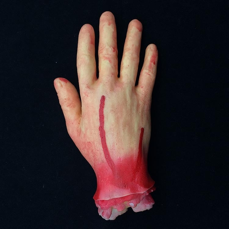Mano mozzata decorazione Halloween 23 cm sangue finto