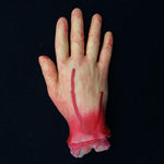 Mano mozzata decorazione Halloween 23 cm sangue finto