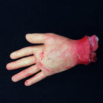 Mano mozzata decorazione Halloween 23 cm sangue finto