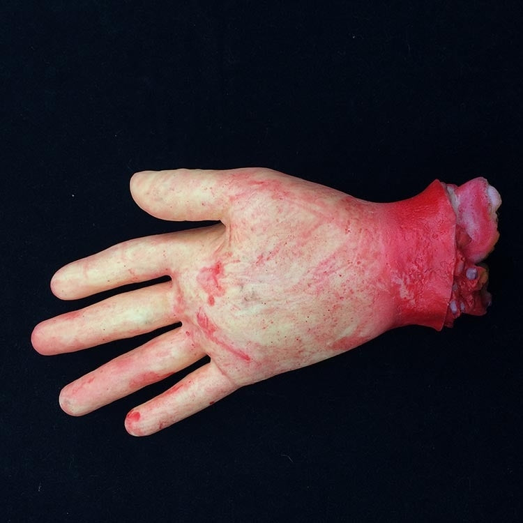 Mano mozzata decorazione Halloween 23 cm sangue finto