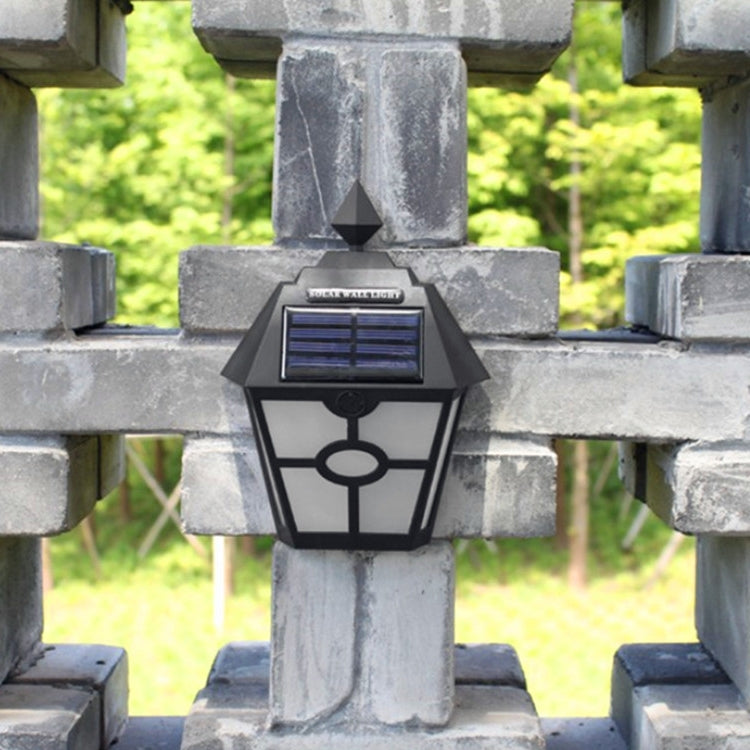Lampada da parete LED solare esagonale con sensore luce