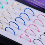 40 anelli per cerchi da naso alla moda in acciaio al titanio con colori misti, misura 0,35 USA, diametro interno: 9 mm, perimetro: 28 mm (colore)