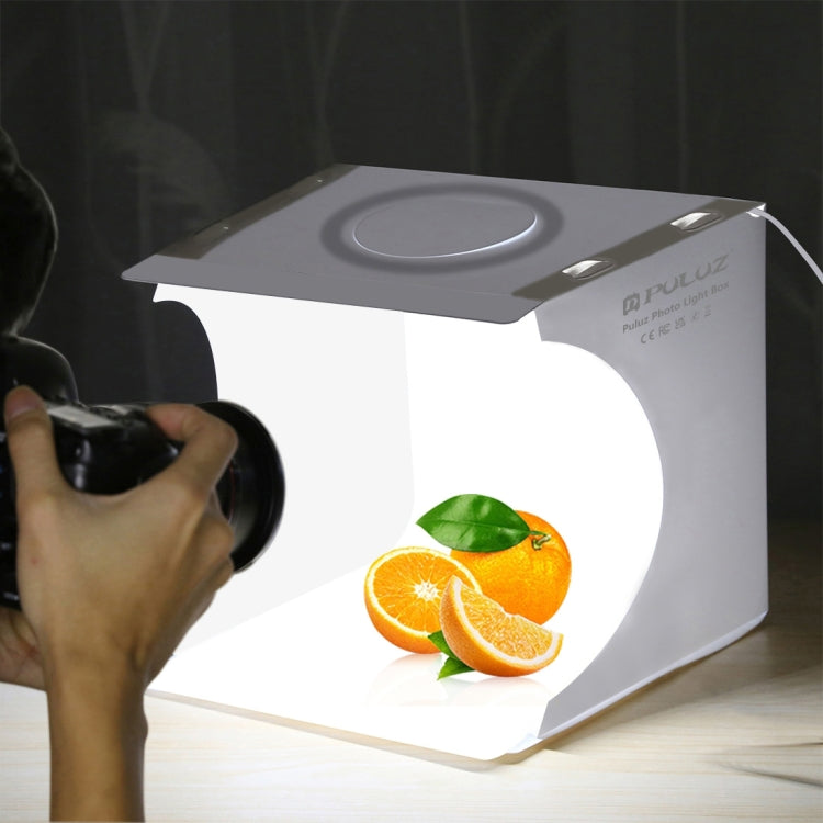 PULUZ Anello LED da 23 cm Pannello LED pieghevole Luce portatile Illuminazione fotografica Kit tenda da studio con fondali a 6 colori (nero, bianco, giallo, rosso, verde, blu), dimensioni da aperto: 24 cm x 23 cm x 23 cm, 23cm Ring LED Panel (RU)      ...