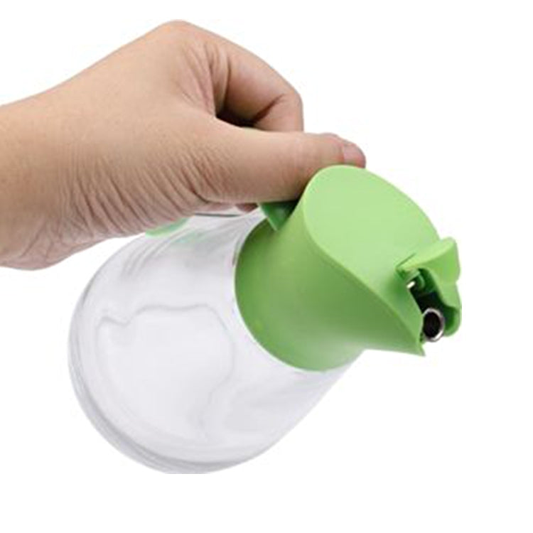 Bottiglia di olio in vetro con apertura automatica del coperchio