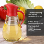 Bottiglia di olio in vetro con apertura automatica del coperchio