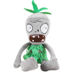 Bambola zombie con vestito verde e catena 20x16x10 cm