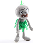 Bambola zombie con vestito verde e catena 20x16x10 cm