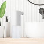 Dispenser automatico di sapone in schiuma a induzione per il lavaggio delle mani Macchina igienizzante intelligente per il bagno dell'hotel, Smart Sanitizing Machine