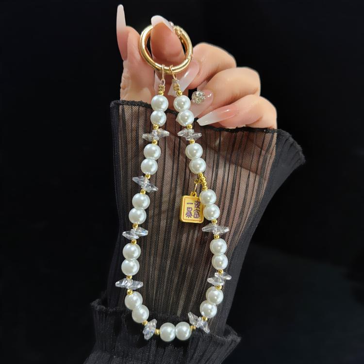 Elegante portachiavi per cellulare con targhetta in lega e perline.