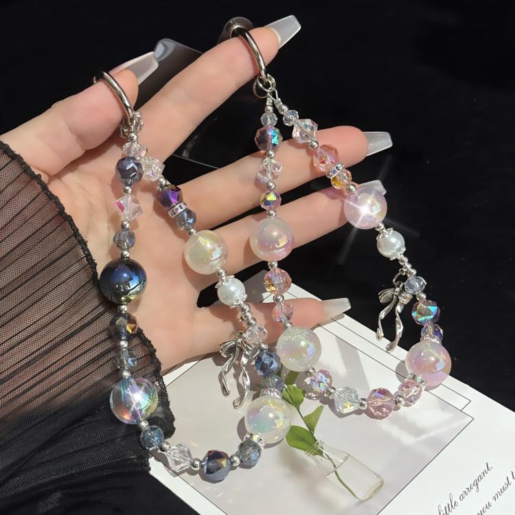Elegante catena con fiocco in lega, lamina d'oro e perle di cristallo.