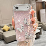 Custodia per telefono con texture a conchiglia, perla 3D, farfalla, diamanti e glitter, con catena a bracciale, For iPhone 17 Pro Max, For iPhone 17 Pro, For iPhone 17, For iPhone Air, For iPhone 16 Pro Max, For iPhone 16 Pro, For iPhone 16 Plus       ...