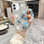 Custodia per telefono in TPU e resina epossidica con farfalla 3D glitterata e bracciale a catena, For iPhone 17 Pro Max, For iPhone 17 Pro, For iPhone 17, For iPhone Air, For iPhone 16 Pro Max, For iPhone 16 Pro, For iPhone 16 Plus, For iPhone 16