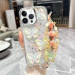 Custodia per telefono in TPU e resina epossidica con farfalla 3D glitterata e catena a bracciale, For iPhone 15 Pro Max, For iPhone 15 Pro, For iPhone 15 Plus, For iPhone 15