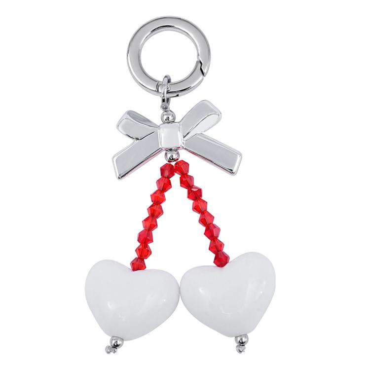 Cinghia per cellulare con ornamento a forma di cuore e fiocco di dopamina