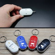 Mini LED fischio portachiavi lampeggiante segnale acustico localizzatore di chiavi smarrite a distanza portachiavi per bambini