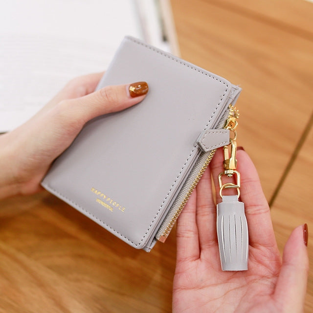 Portafoglio da donna con nappa bifold dal design breve Porta carte di credito corto in pelle PU