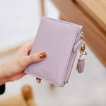 Portafoglio da donna con nappa bifold dal design breve Porta carte di credito corto in pelle PU