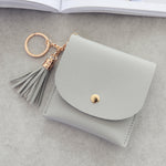 Portafoglio da donna alla moda in pelle corta Mini porta carte d'identità casual Borse da donna Pochette con moneta Borsa con nappa