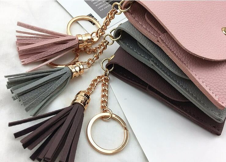Portafoglio da donna alla moda in pelle corta Mini porta carte d'identità casual Borse da donna Pochette con moneta Borsa con nappa