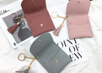 Portafoglio da donna alla moda in pelle corta Mini porta carte d'identità casual Borse da donna Pochette con moneta Borsa con nappa