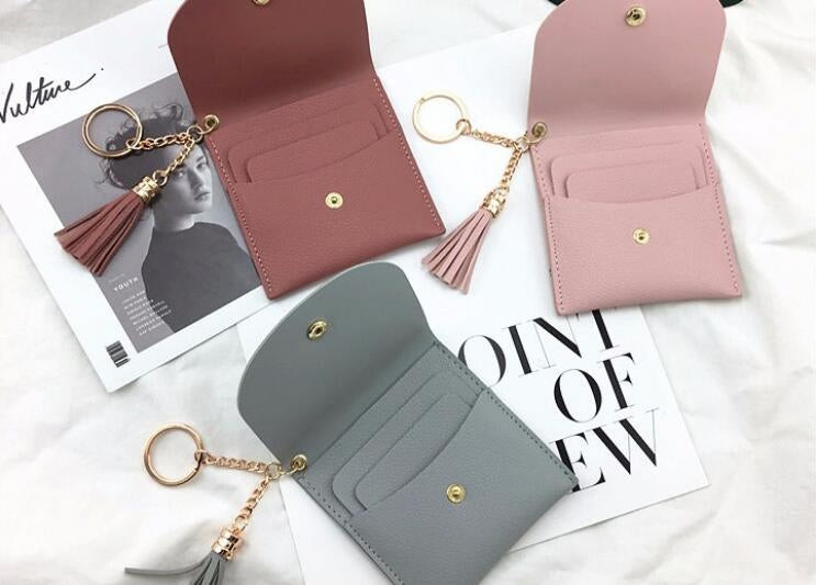 Portafoglio da donna alla moda in pelle corta Mini porta carte d'identità casual Borse da donna Pochette con moneta Borsa con nappa