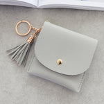 Portafoglio da donna alla moda in pelle corta Mini porta carte d'identità casual Borse da donna Pochette con moneta Borsa con nappa