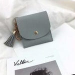 Portafoglio da donna alla moda in pelle corta Mini porta carte d'identità casual Borse da donna Pochette con moneta Borsa con nappa