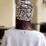 Berretto turbante multiuso con motivo lettera da donna. Berretto chemioterapico
