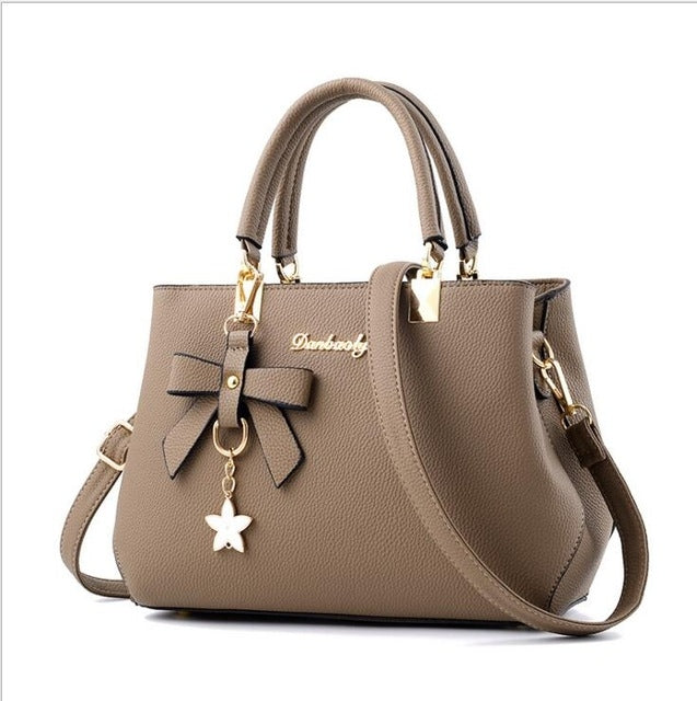 Borsa a tracolla dolce con fiocco in fiore di prugna di lusso da donna