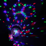 E27 6W LED a doppia testa lampadina colorata rotante lampada di proiezione laser con luce scenica a sfera magica E27