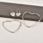Set di orecchini a cerchio a forma di cuore d'amore in metallo semplice moda donna