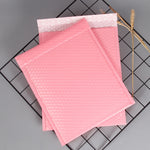 Borsa da imballaggio addensata per imballaggio logistico con pellicola a bolle di coestrusione rosa da 50 pezzi, 25x30cm, 32x38cm, 35x45cm, 35x38cm, 40x45cm, 50x45cm, 23x28cm, 28x35cm, 65x45cm