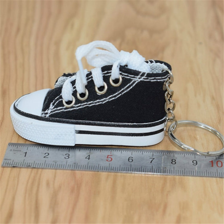 Ciondolo portachiavi sneaker con mini scarpe di tela da 2 pezzi
