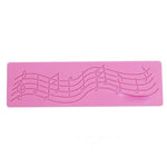 Stampo in silicone per decorazione torta note musicali 20x6 cm