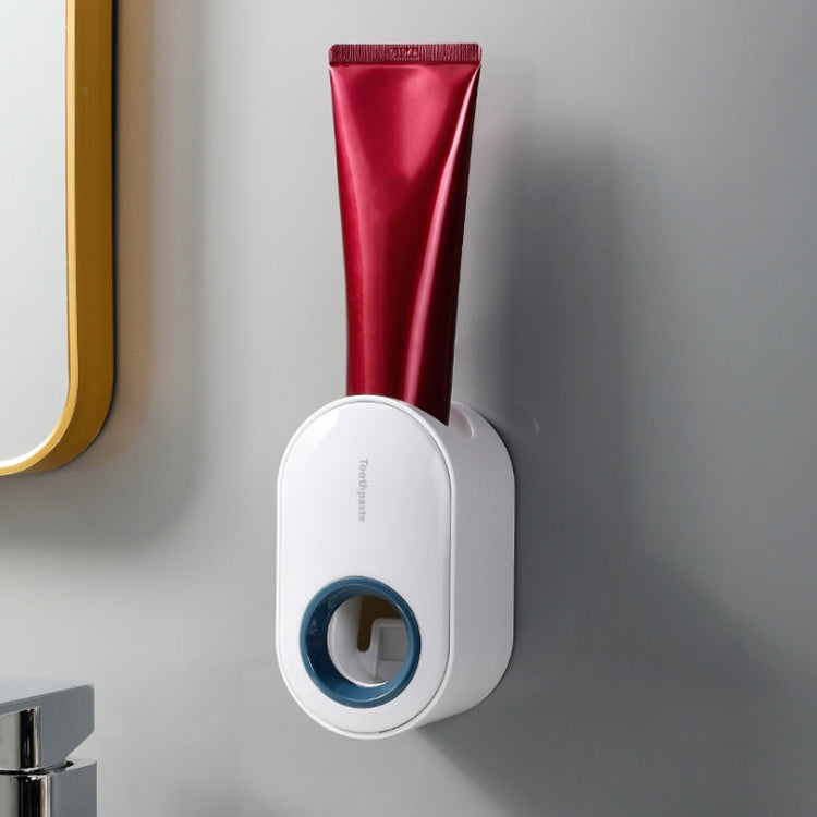 Portadentifricio a parete con spremitura automatica del dentifricio