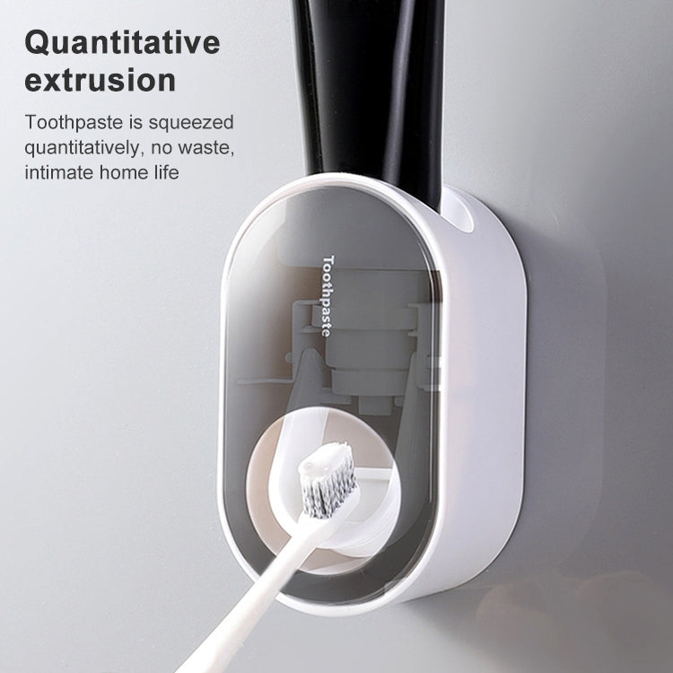 Portadentifricio a parete con spremitura automatica del dentifricio