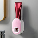 Portadentifricio a parete con spremitura automatica del dentifricio