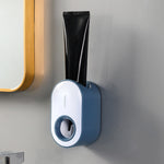 Portadentifricio a parete con spremitura automatica del dentifricio