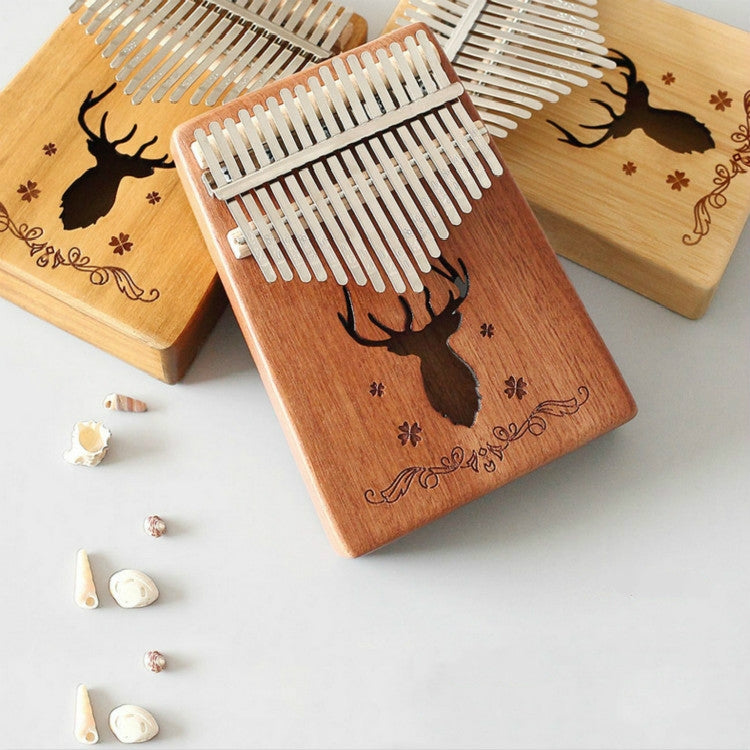 Pianoforte portatile Kalimba a 17 toni, Mahogany-Classic Deer, Bamboo-Classic Deer, Mahogany-Sun God, Mahogany-Six-Pointed Star, Mahogany-Blue (Classic Deer), Spruce-Classic Deer, White-Classic Deer, Acacia-Classic Deer, Sapele-Classic Deer            ...