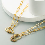 Collana da donna con squisita catena a clavicola in ottone micro-intarsiato con zirconi, Lock, Cloud