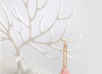 Organizzatore di esposizione di cosmetici per gioielli, collana, porta rossetto, anello creativo a forma di corno di plastica