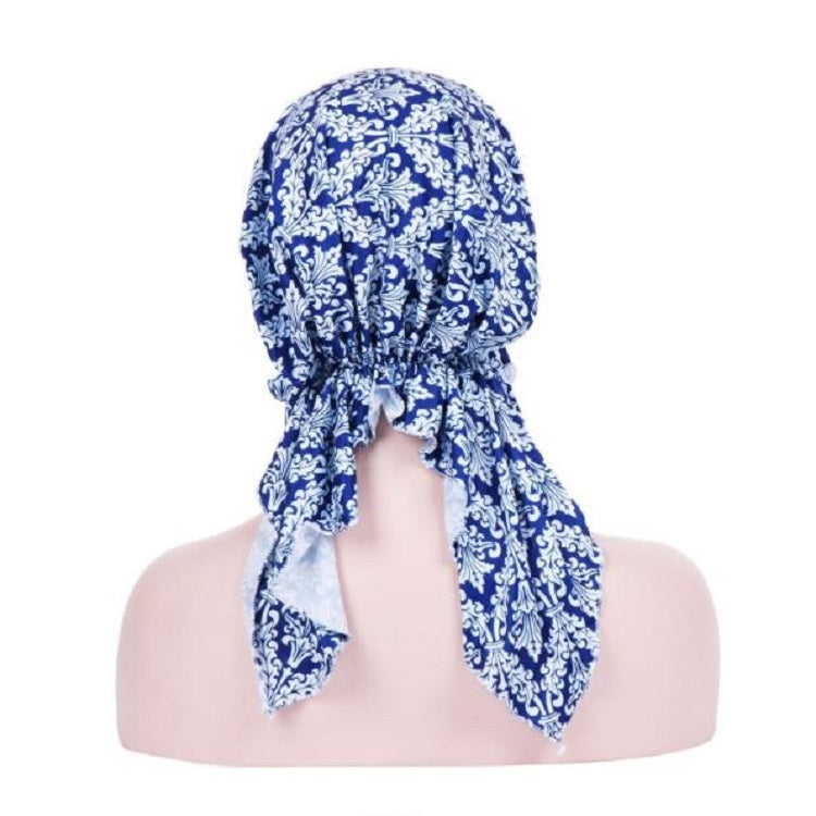 Cappello turbante curvo in tessuto floreale con stampa elasticizzata, M 56-58cm