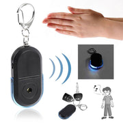 5 pezzi portatile anti-smarrimento allarme chiave finder wireless fischio suono LED localizzatore di luce