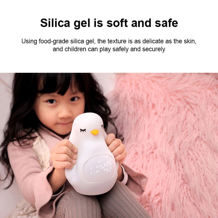 I simpatici fagioli in silicone multifunzionali creativi del pinguino svegliano i bambini che dormono Sveglia elettronica a LED