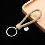 Portachiavi in pelle con ciondolo per auto con cordoncino in pelle intrecciata da 100 pezzi, Baotou With Small Round Piece